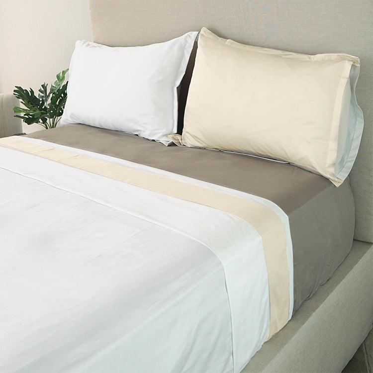 Sábana plana plat con bastilla de color