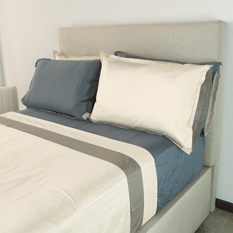 Sábana plana plat con bastilla de color